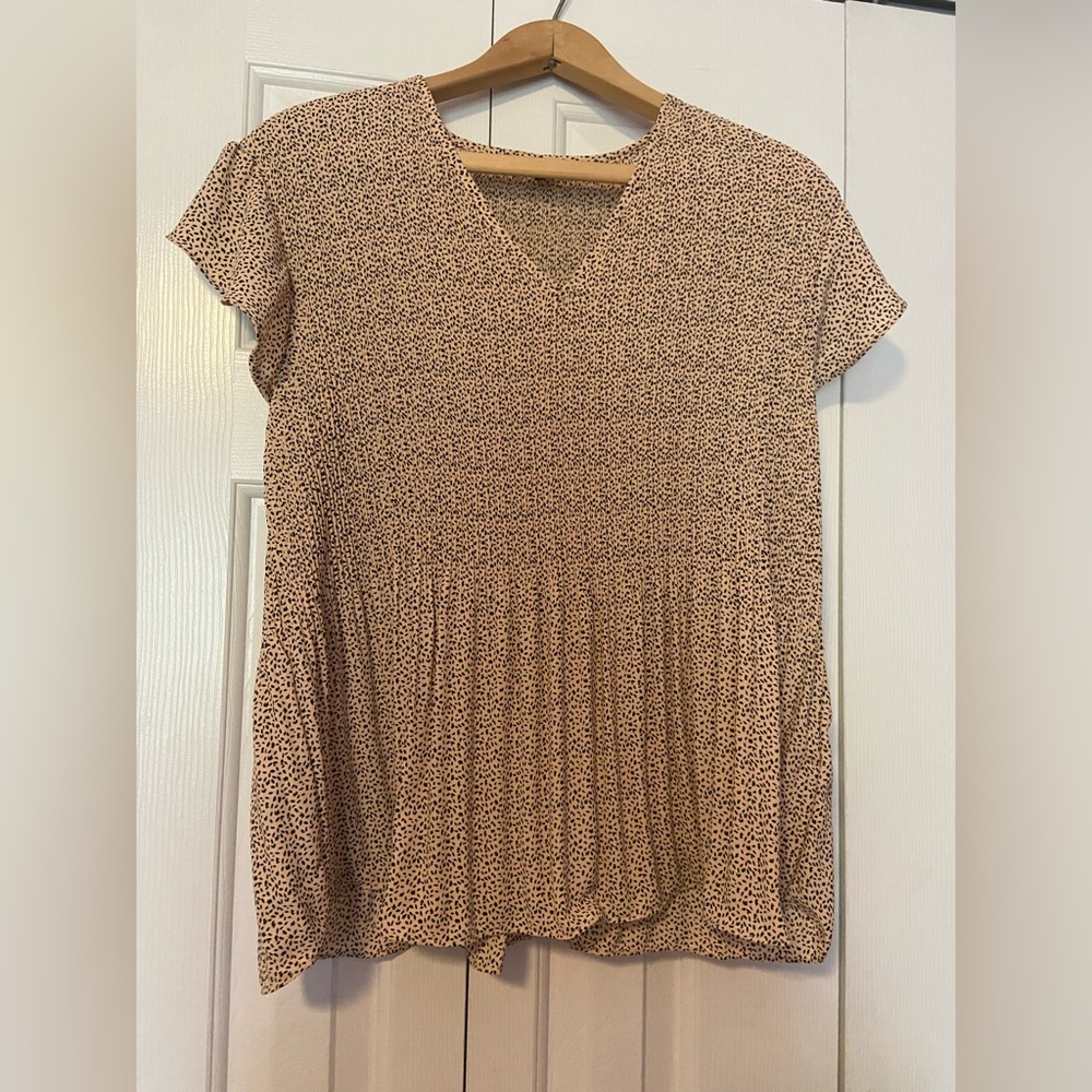 Women’s cheetah print short sleeve high low top